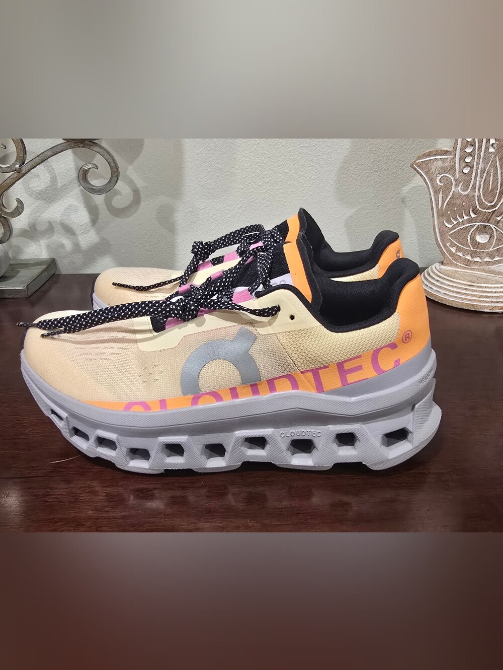 On Running Cream Sneakers with Orange Heel and Pink Accents